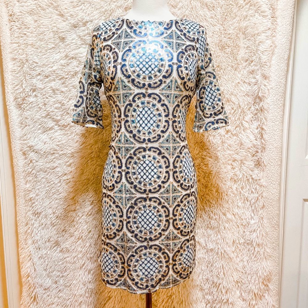 Intricate sequined 3/4 sleeved dress